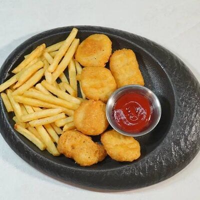 Куриные наггетсы с кетчупом в Edateca по цене 400 ₽