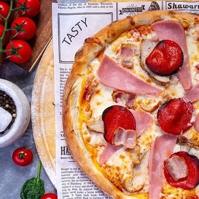 Пицца Мясной пир 650 г в Donna Maria PREMIUM по цене 1480 ₽