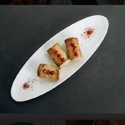 Баклажаны, фаршированные грецкими орехами в Кафе Хинкальная по цене 655 ₽