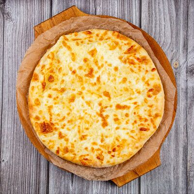 Осетинский пирог с сыром и картошкой в Духанъ Алаверды по цене 690 ₽