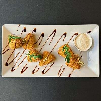 Моцарелла жареная в Трюфель по цене 440 ₽