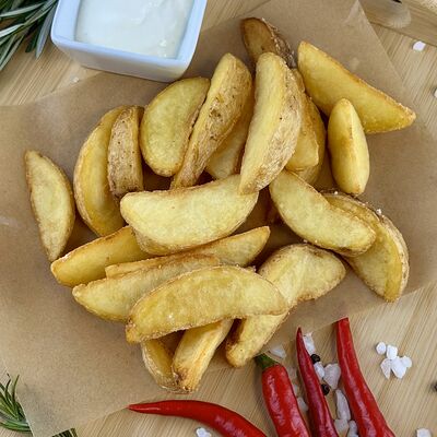 Картофельные дольки в Корпус О бар по цене 380 ₽