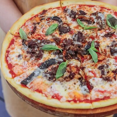 Пицца Густо Локале в Лимончини по цене 990 ₽