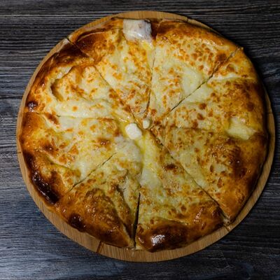 Закрытый хачапури в ТУТ КУХНЯ по цене 750 ₽