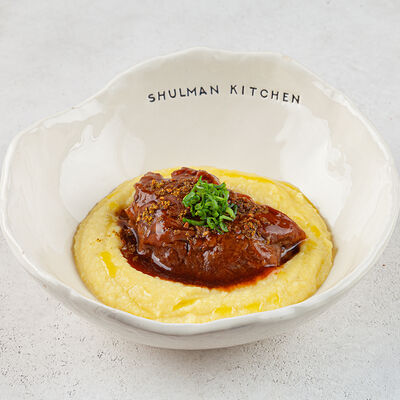 Томленая щека теленка с картофельным пюре и трюфельным маслом в Shulman Kitchen по цене 1300 ₽