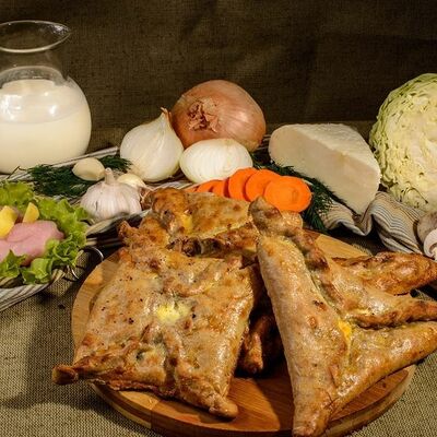 Чукуры с олениной в сметанном соусе в Пироги по-коми по цене 1268 ₽