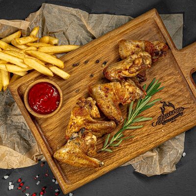 Куриные крылышки и фри в Shawarmahouse по цене 540 ₽