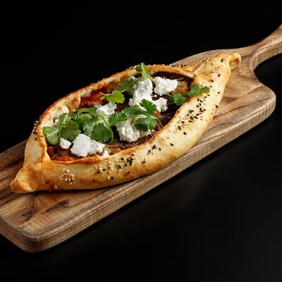 Балтийская лепешка с томленой говядинойв Про печь по цене 665 ₽