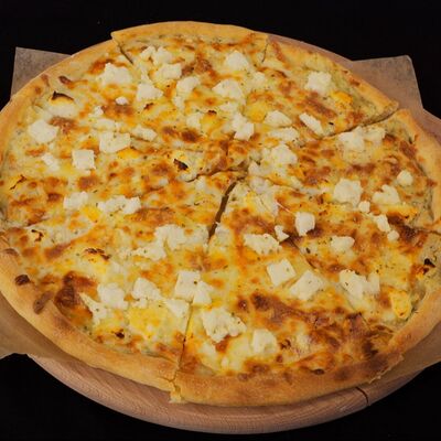 Пицца сырная в Богатырь по цене 750 ₽