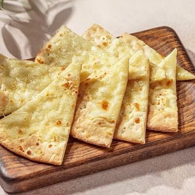 Фокачча с чесноком и оливковым маслом в Перчини на огне по цене 240 ₽