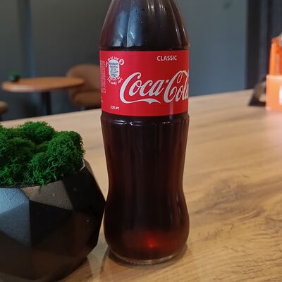 Coca-Cola в Black Coffee по цене 155 ₽