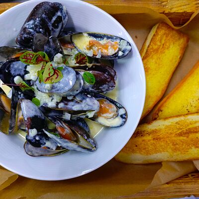 Мидии в сырном соусе в Трактир Распутинский по цене 910 ₽