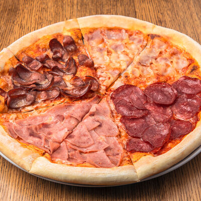 Пицца Четыре сеньора в Помидорро по цене 675 ₽