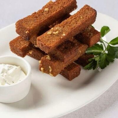 Чесночные гренки в Горячо и вкусно по цене 320 ₽