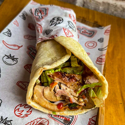 Шаурма с курицей в лепешкев Meat Chef по цене 330 ₽