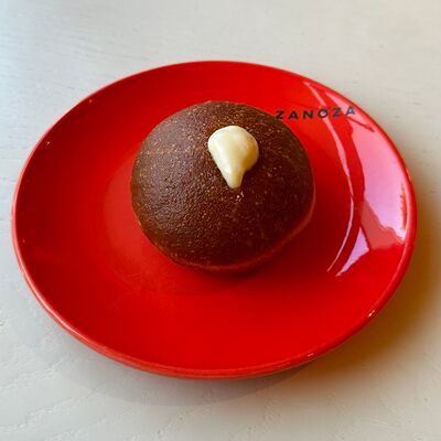 Пончик с заварным кремом в Zanoza Kруассантерия по цене 230 ₽