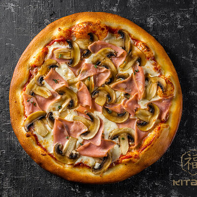 Пицца с ветчиной и грибами в Kitana по цене 828 ₽