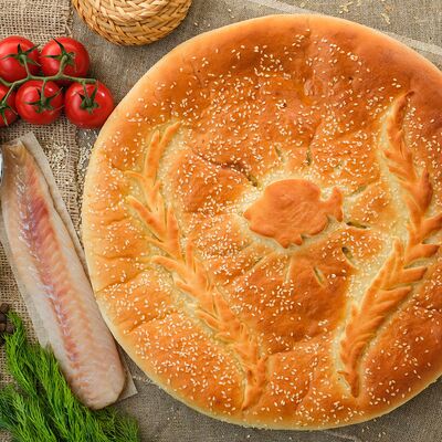 Пирог с белой рыбой и картофелем в молоке в Пироги по-коми по цене 1798 ₽