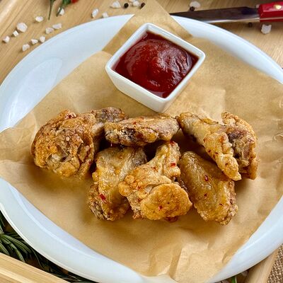 Крылья в кисло-сладком соусе в Корпус О бар по цене 470 ₽