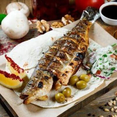 Сибас с картофелем на углях в Огонь и Мясо по цене 1200 ₽