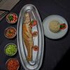 Poisson sosso frit moyen в Chez tantie Alice по цене 5500