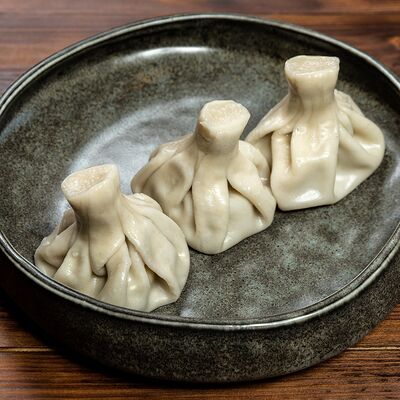 Хинкали с цыпленком в сливках в Трактир Колесо по цене 396 ₽