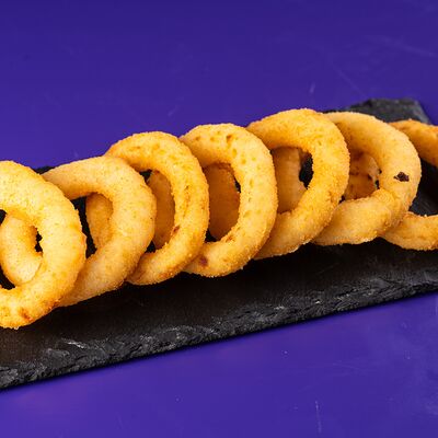 Луковые кольцав Космос бургер по цене 180 ₽