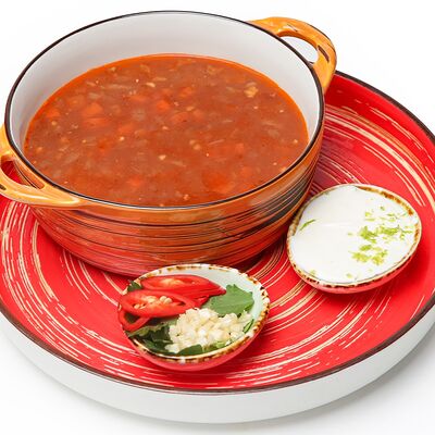 Мексиканский суп с говядиной в Chillis Bar по цене 550 ₽