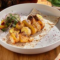Картофель с курдюком на мангале в Liman
