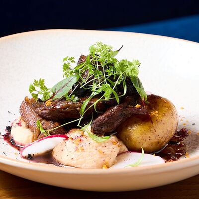 Томленый ягненок с айвой и маринованной черноплодной рябиной в NANA Pirveli по цене 1440 ₽