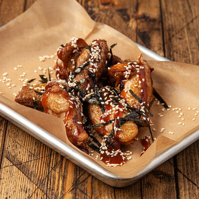 Куриные крылья BBQ в Это Бар по цене 460 ₽