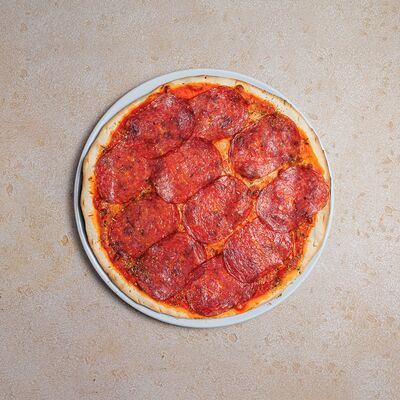 Пицца с салями в Bocconcino по цене 1360 ₽