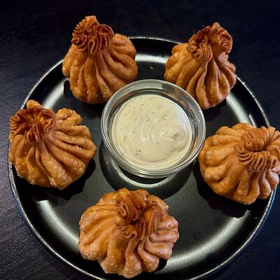 Жареные хинкали с говядиной и курицей в Красножар по цене 485 ₽