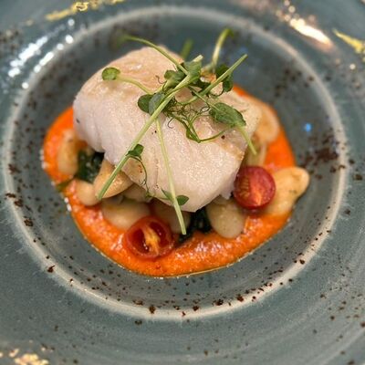 Треска с белой фасолью и соусом чили калабрийский в Ранчо Grill & Bar по цене 1150 ₽