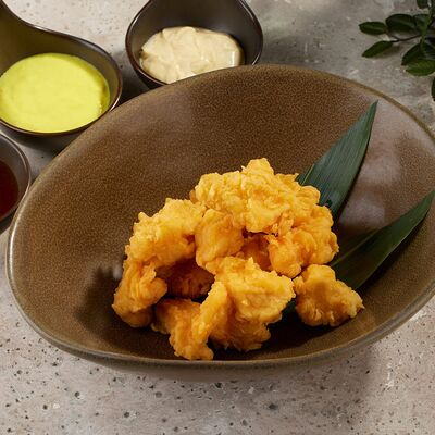 Куриные байтсы со сливочно-сырным соусом в Паназия & Суши-рум по цене 360 ₽