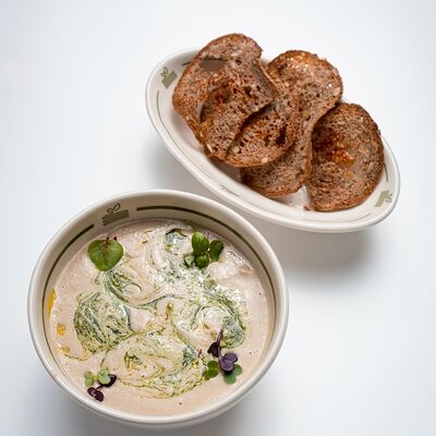 Янд. Грибной крем-суп с песто и трюфельным маслом в NoSugar bakery по цене 870 ₽