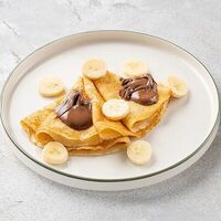 Блинчики с бананом и пастой Nutella в Шоколадница