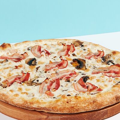 Снежная пицца 25 см в Ostrov по цене 637 ₽