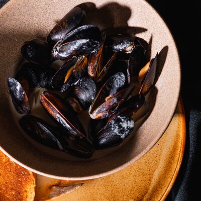 Мидии в соусе том ям в Tre/Quarti по цене 1390 ₽