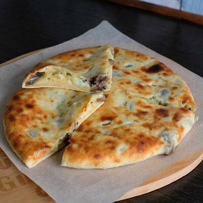 Хачапури по-осетински с грибами в Хачапури & Кофе по цене 350 ₽