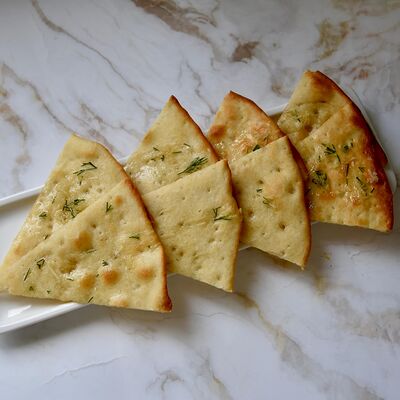 Лепешка пряная с чесноком в Сметана на Б. Садовой по цене 199 ₽