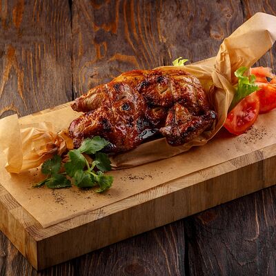 Цыпленок на решетке в У Ханумы по цене 880 ₽