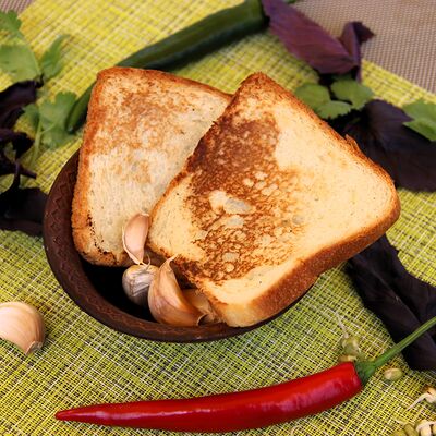 Хлебцы с чесноком в АрисА - лавка азиатской еды по цене 40 ₽