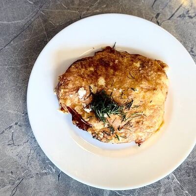 Отбивная из свинины с помидорой в Восточный экспресс по цене 233 ₽