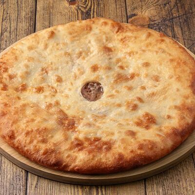 Осетинский пирог с курицей в The Мясо по цене 1419 ₽