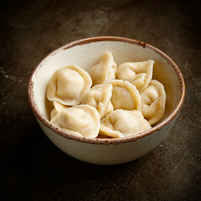 Классические пельмени с бульоном в Корчма по цене 530 ₽