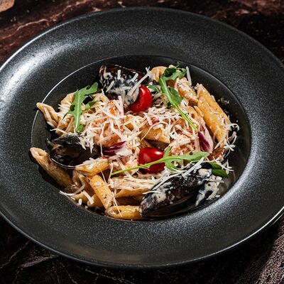 Паста с морепродуктами в Moslounge & Bar по цене 750 ₽