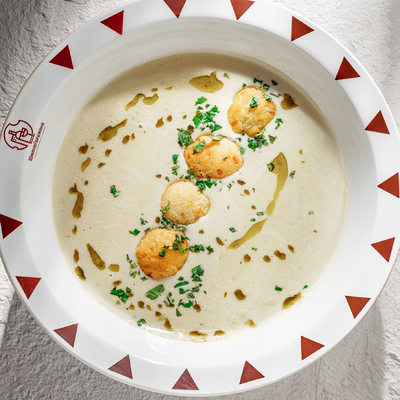 Сырный суп в ЮжанеГорожане по цене 738 ₽