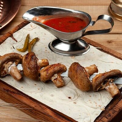 Шампиньоны на мангале в Шашлыки на углях по цене 390 ₽