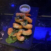 Креветки в панировке с соусом васаби в Veranda Bar